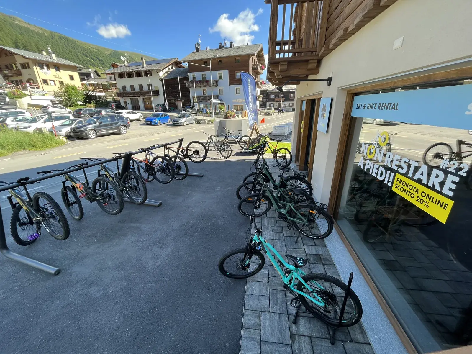 Bikes in the rack outside the Carosello 3000 shop